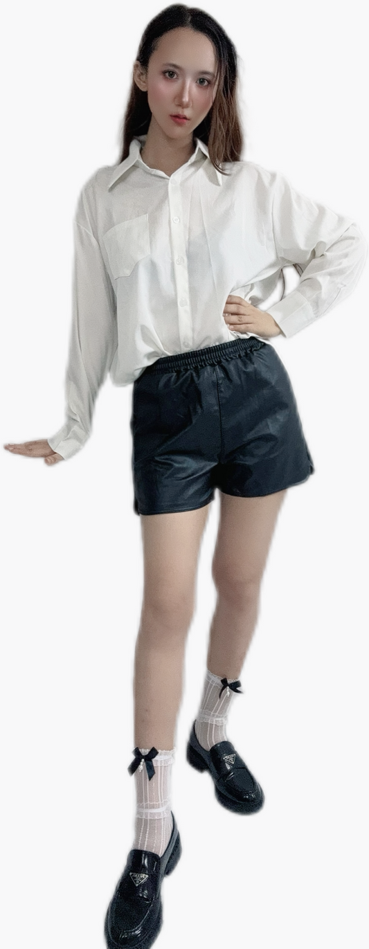 "Noir Leather Shorts with edgy style"